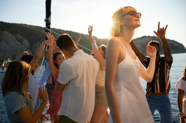 Lisbon: Sightseeing Cruise with Open Bar, DJ & Swim Stop - What’s Included and What’s Not