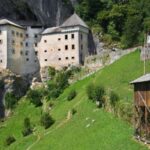 Ljubljana: Postojna cave & Predjama castle small group tour - The Charm of Predjama Castle