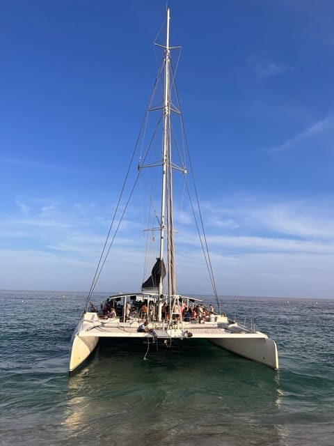 Lloret de Mar: Sunset Catamaran Cruise with DJ and Drinks - The Itinerary Breakdown: What to Expect