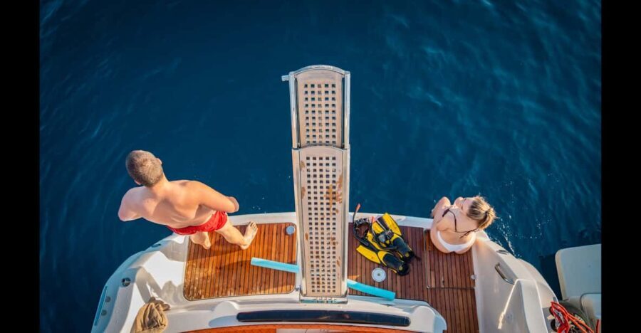 Luxury yacht: Sunset Blue Cave & Panoramic Tour w Wine - Detailed Itinerary Breakdown