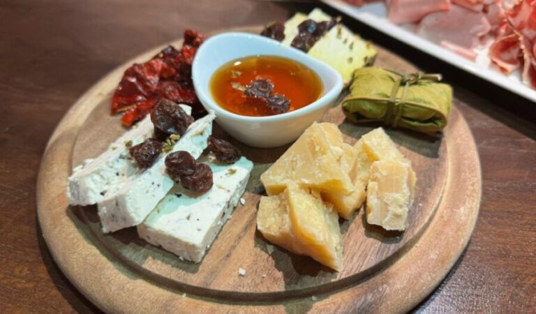 Milan: Aperitivo with Food Selection & a Glass of Wine - The Value of the Experience