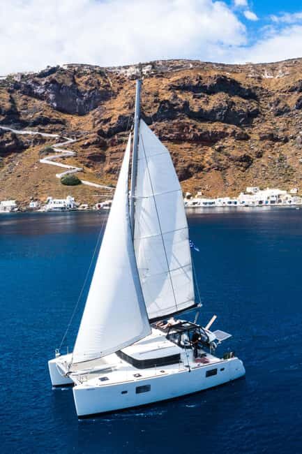 Private Catamaran Cruise in Santorini and BBQ Drinks - The Onboard BBQ Lunch and Drinks