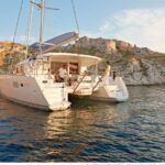 Private Morning Tour Lagoon 400-380 Sailing in Santorini ,lunch, drink, transfer - The Itinerary: What to Expect