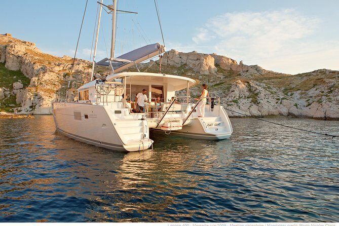 Private Morning Tour Lagoon 400-380 Sailing in Santorini ,lunch, drink, transfer - The Itinerary: What to Expect