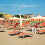 Rimini: Beach Umbrella and Sun Bed at 67 Beach with Drink - Practical Details and Tips