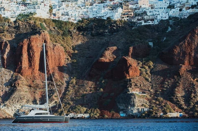 Santorini: Private Catamaran Cruise with BBQ Meal and Drinks - The Journey to Thirassia and Understated Charm