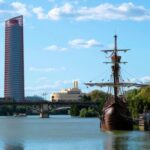 Seville: Guadalquivir & Secrets of Triana Small Group Tour - Crossing into Triana: A Neighborhood with Soul