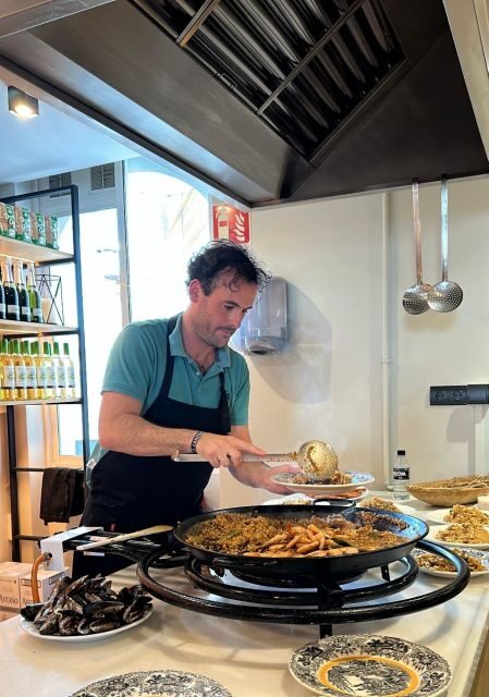 Seville: Paella-Cooking Experience with Sangria & Full Meal - Watching the Paella Come to Life