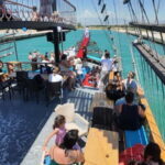 Side: Dolphin Boat Tour With Lunch Foam party Swimming - The Value of This Tour