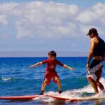 Surfing Waikiki with Local Firefighters , transport available - Pricing & Value