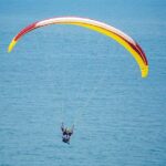 Tandem Paragliding Adventure  Coast, Mountains & Sunset - The Scenic Highlights: Coast vs. Mountains