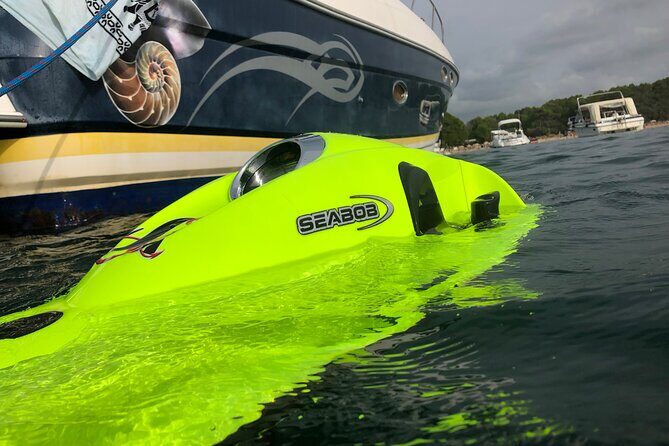 Tour in Seabob Secret Caves of Cala Bassa with Paella and Sangria - Practical Details and Tips