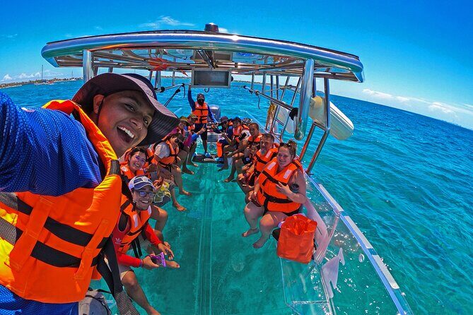 Tour Isla Mujeres excursion in Collective Transparent Boat - What to Expect from the Experience