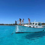 Traditional boat 10 beaches in the south of Menorca. Snorkeling, SUP and drinks - What Do the Reviews Say?
