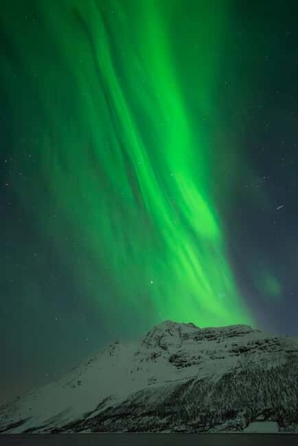 Tromsø: Northern Lights in a minibus with free photos and a warm meal! - What really makes this tour stand out
