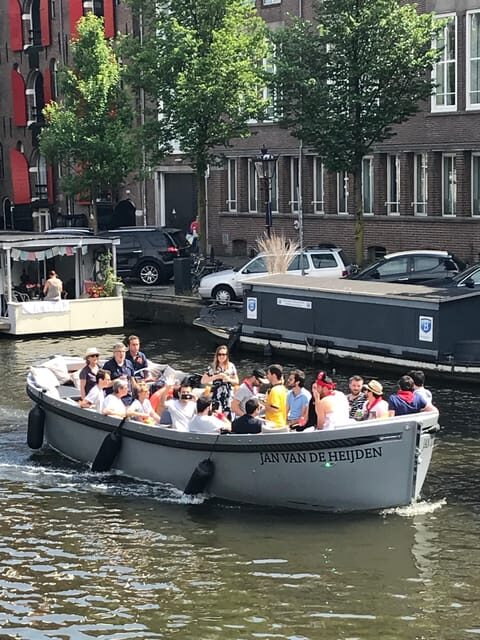 Visit Amsterdam by Boat with a French Guide (french) - The Experience in Detail