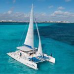 Cancún: Catamaran Tour to Isla Mujeres with Open Bar & Lunch - What’s Included & What’s Not