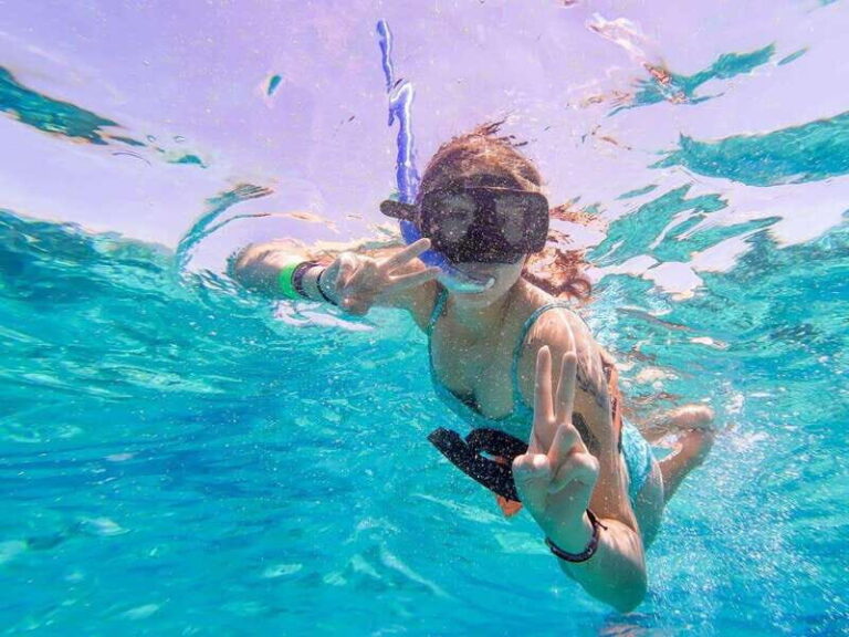 Cancun: Isla Mujeres Premium Catamaran Half-Day Tour - The Pickup and Departure