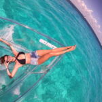 Explore the sea of cozumel in a transprent boat with drinks and snorkel. - The Highlights in Detail