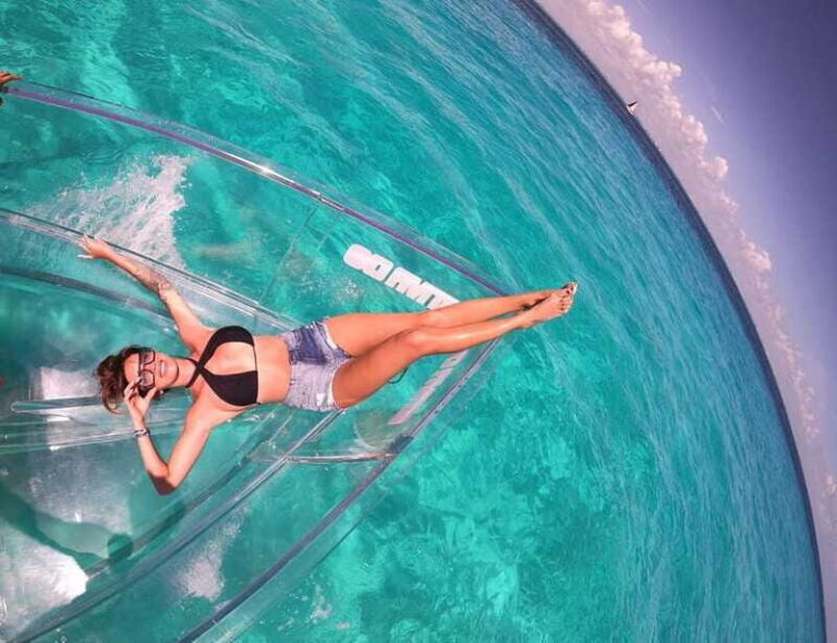 Explore the sea of cozumel in a transprent boat with drinks and snorkel. - The Highlights in Detail