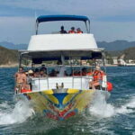 Huatulco: Premium Boat Tour with snorkel experience. - First Stop: Chachacual Bay - A Hidden Coastal Gem