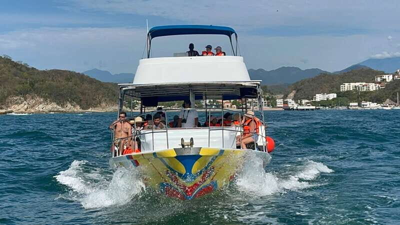 Huatulco: Premium Boat Tour with snorkel experience. - First Stop: Chachacual Bay - A Hidden Coastal Gem