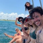 Isla Mujeres Full-Day Catamaran Tour  Buffet, Open Bar & Pickup - Snorkeling at the Coral Reef