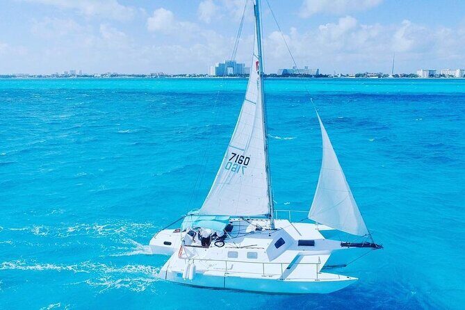 Luxury Catamaran to Isla Mujeres, Snorkeling, Buffet and Ice Bar - Value and Considerations