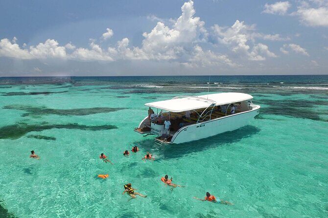 Private Boat to Isla Mujeres with Open Bar from Playa del Carmen - The Return and Sunset Celebration