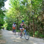 Rio Secreto Nature Reserve: Bicycle, Rappel & Ziplines Tour - Walking through the Caves and Underground River