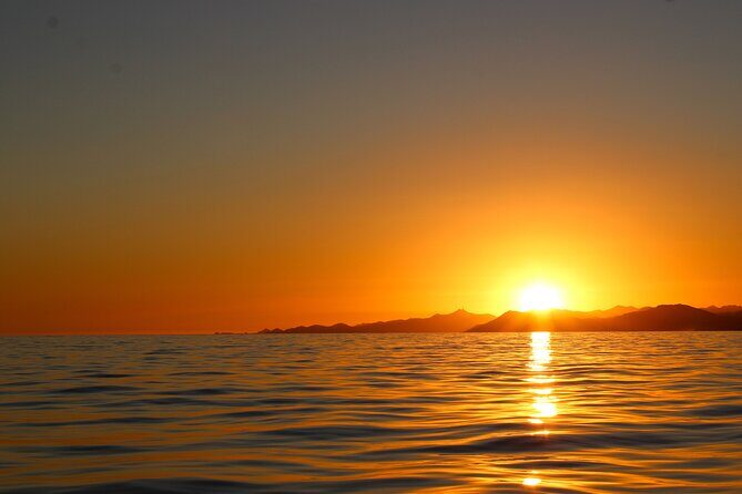 Shared Cabo Sunset Cruise with Open Bar and Scenic Views - Who Will Love This Experience?