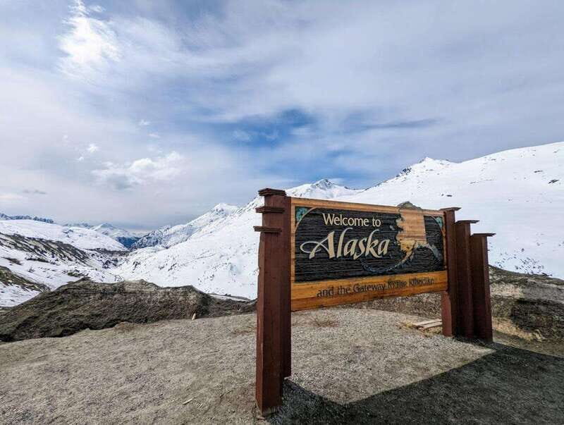 Skagway: Klondike Highway & Yukon Bus Tour with Husky Kennel - Crossing into Canada: The Yukon Suspension Bridge
