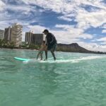 Surf lessons for beginners in Waikiki - The Water Experience: Catching Waves