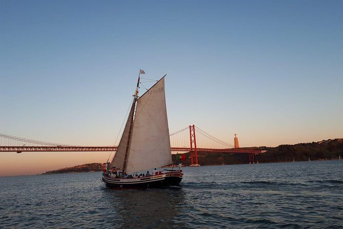 2-Hour Lisbon Traditional Boats Sunset Cruise with White Wine - The Wine and Hospitality