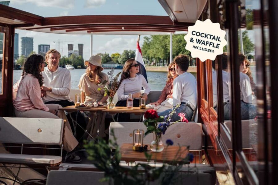 Amsterdam: Luxury Saloon Boat Cruise with Cocktails & Waffle - Classic vs Deluxe Open Bar: What Changes for Your Money