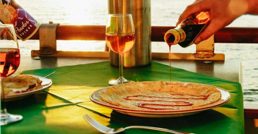 Amsterdam: River Cruise With All-You-Can-Eat Dutch Pancakes - Getting to the boat: the free ferry from Amsterdam Central