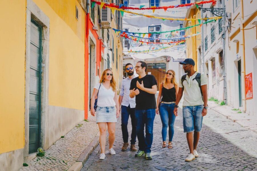 Best of Lisbon Walking Tour: Rossio, Chiado & Alfama - Rossio Square and the ornate Rossio Central Station moment