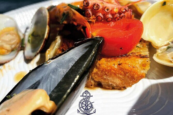 Boat excursion with lunch on board to discover Ischia - The Dramatic Cliffs of Punta Imperatore