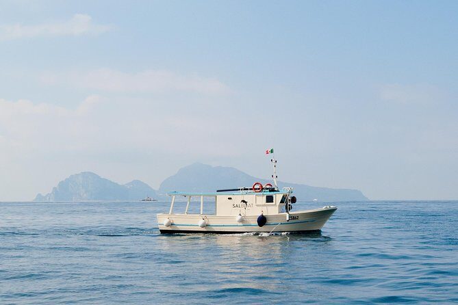 Fishing and Tourism in Capri - The boat day pace: fishing first, Capri second (if you want it)