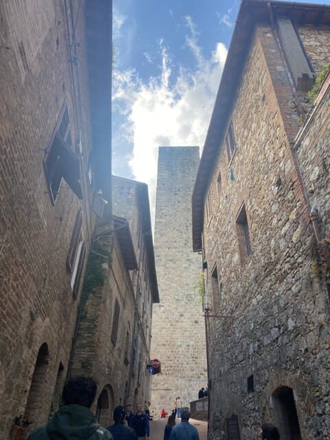 Florence: Day Trip with Free Time in San Gimignano and Siena - Meeting Point: Piazzale Montelungo Is the Key