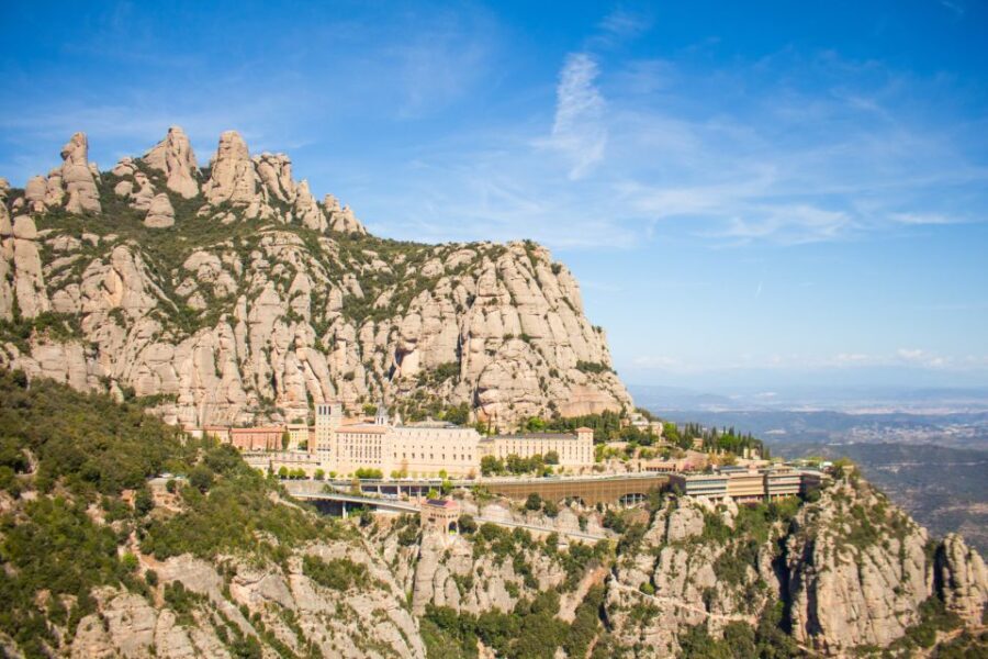 From Barcelona: Half-Day Montserrat Small Group Guided Tour - Booking Smart: The Black Madonna vs. Boys Choir Option