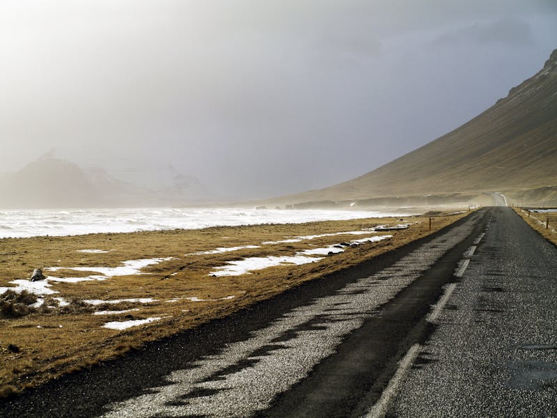 Moody coastal road Iceland misty mountains
