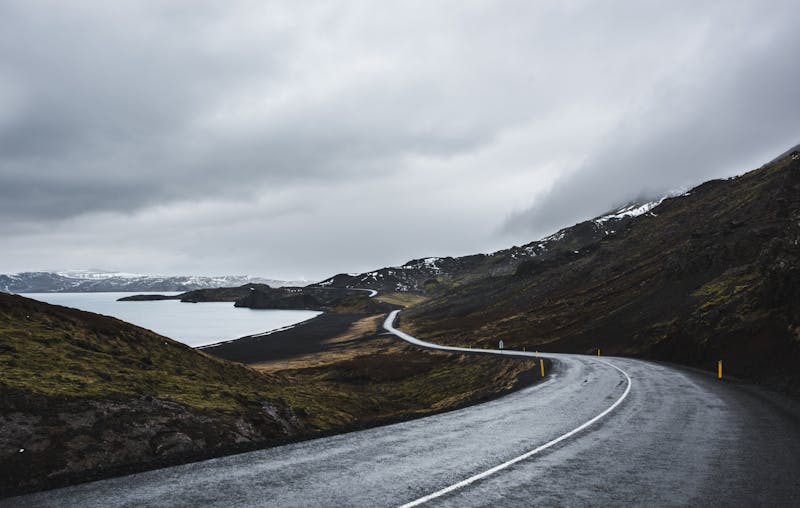 Winding road through Iceland rugged landscape