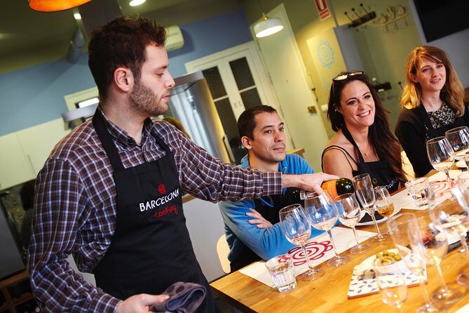 Interactive Paella & Market: Bottomless Wine & Rambla Views - Cooking Station Reality: You’re Not Watching, You’re Working