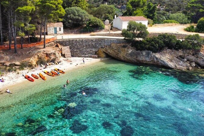 Kayak tour with aperitif and dolphins - Paddling Into Cala Moresca: Your First Real Stop