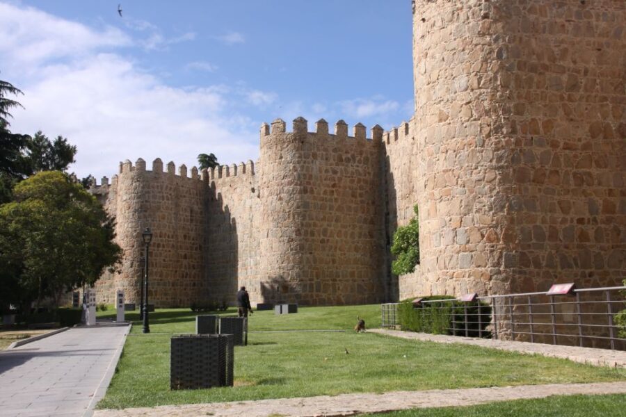 Madrid: Avila and Segovia Day Trip with Tickets to Monuments - Meeting point in Madrid, bus comfort, and how the tour keeps you moving