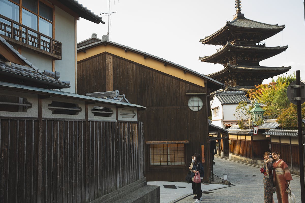 Kyoto street scene with the Yasaka Pagoda and traditional wooden houses