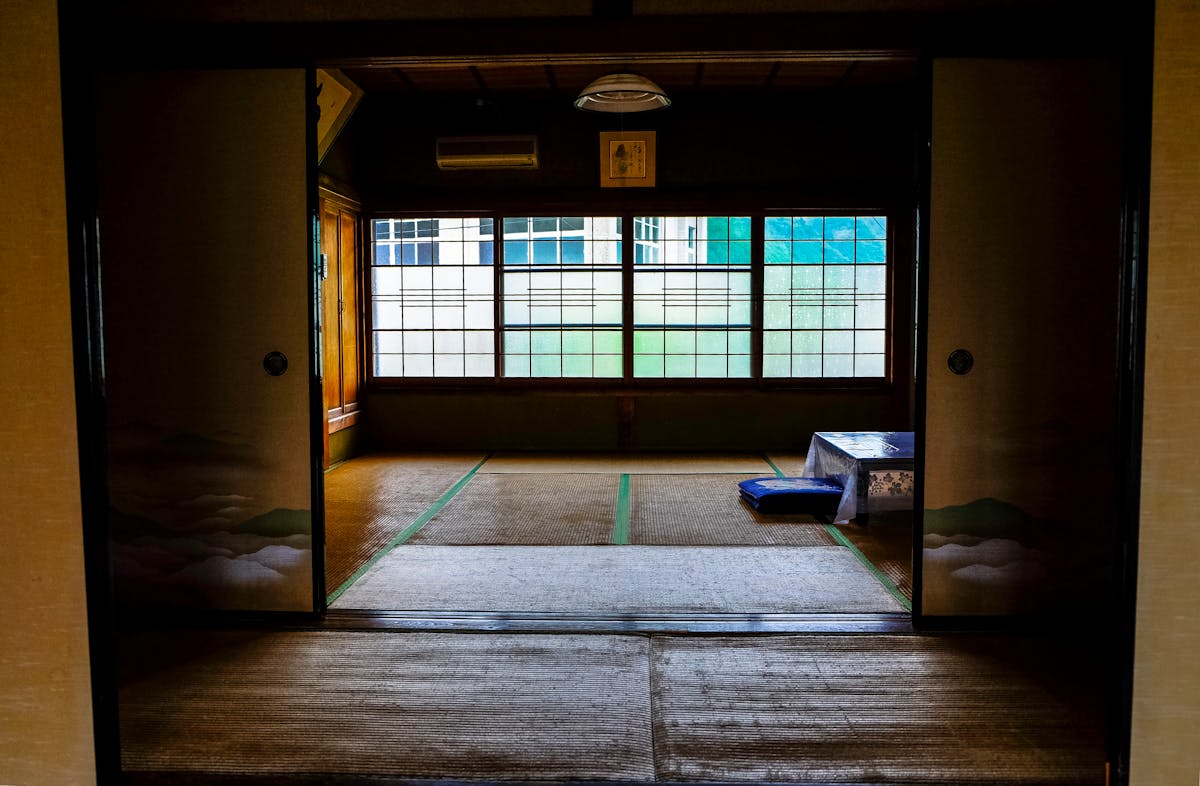 Traditional Japanese ryokan room with tatami flooring
