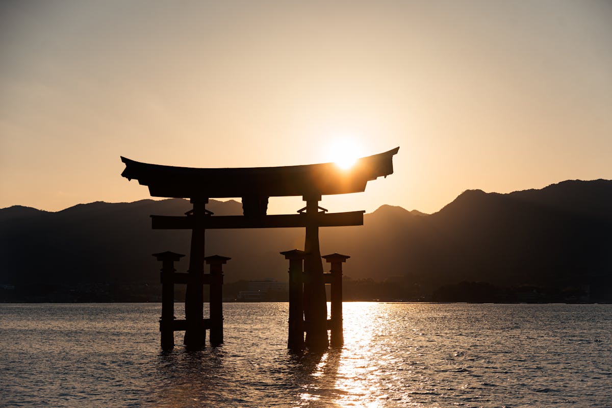 Itsukushima Shrine torii gate at sunrise Hiroshima Japan