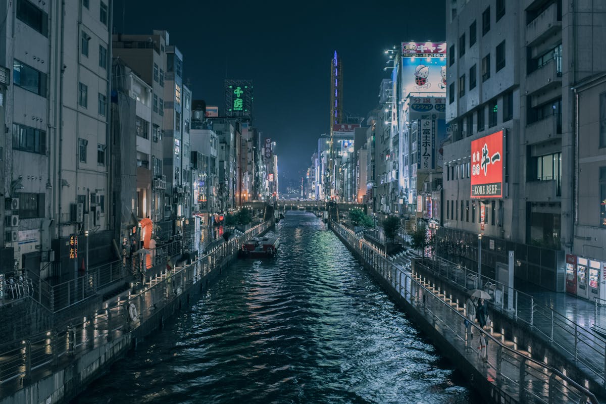 Osaka canal with illuminated cityscape